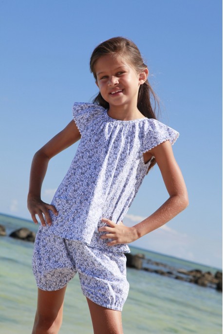 Girls' short bloomer pyjama made of printed sky blue fabric